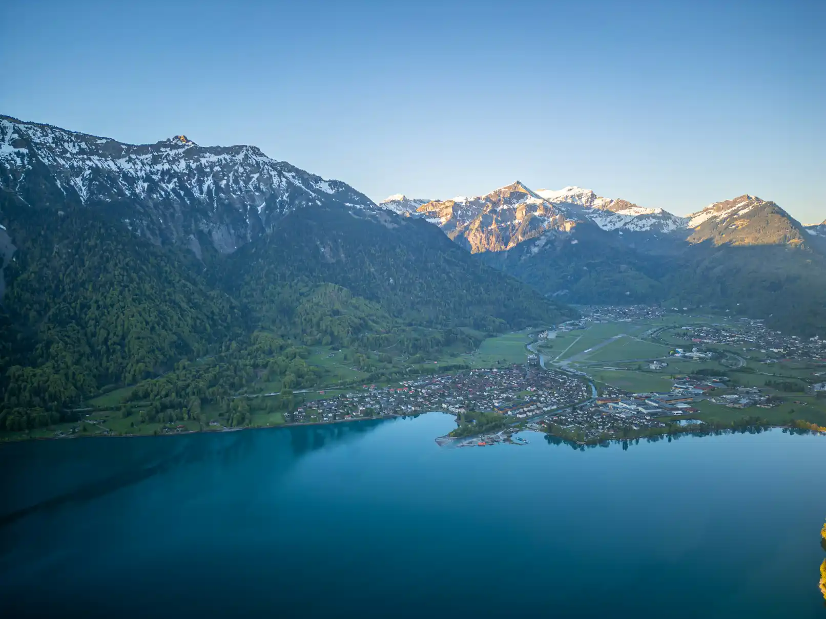 Aerial view of a Canadian alpine lake surrounded by mountains